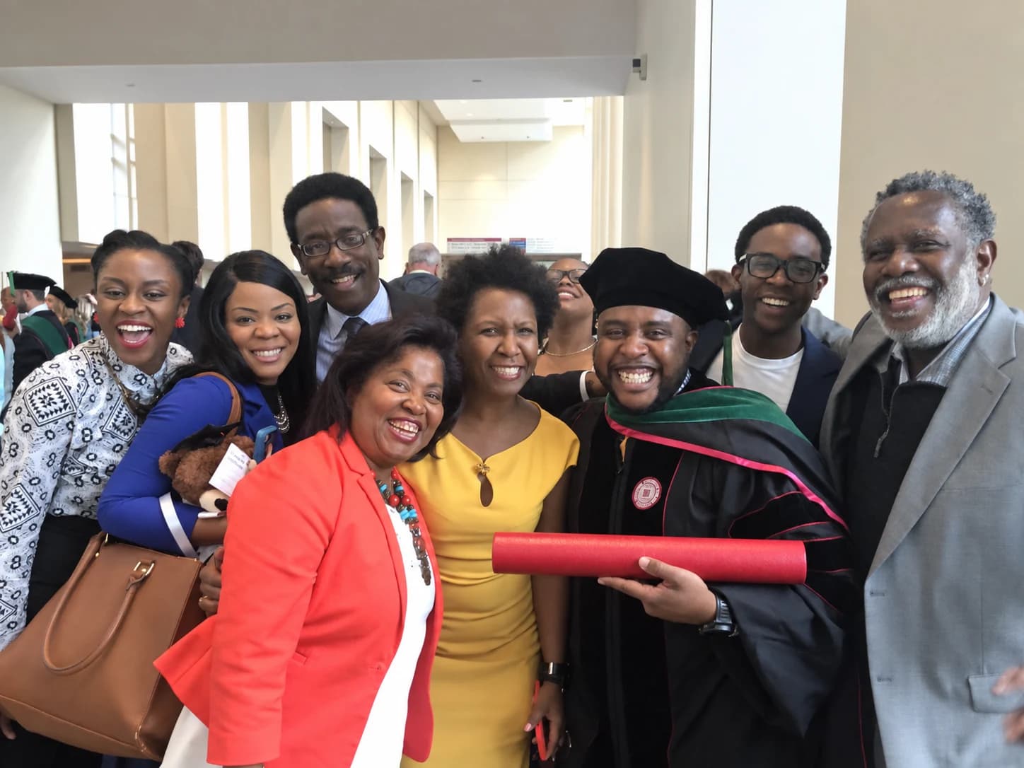 Christopher at his medical school graduation with family